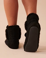 Pantoufles bottines effet tricoté à pompons