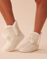 Pantoufles bottines effet tricoté à pompons