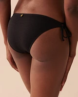 Bas de bikini brésilien noué aux hanches texturé POPCORN