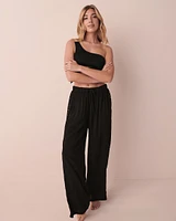 Pantalon jambe large détail de crochet