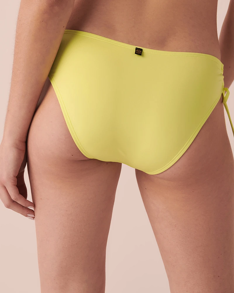 Bas de bikini brésilien noué aux hanches en fibres recyclées SUNNY LIME
