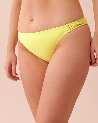Bas de bikini bandes sur les côtés en fibres recyclées SUNNY LIME