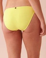 Bas de bikini bandes sur les côtés en fibres recyclées SUNNY LIME