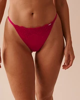 Culotte string ajustable en microfibre et dentelle