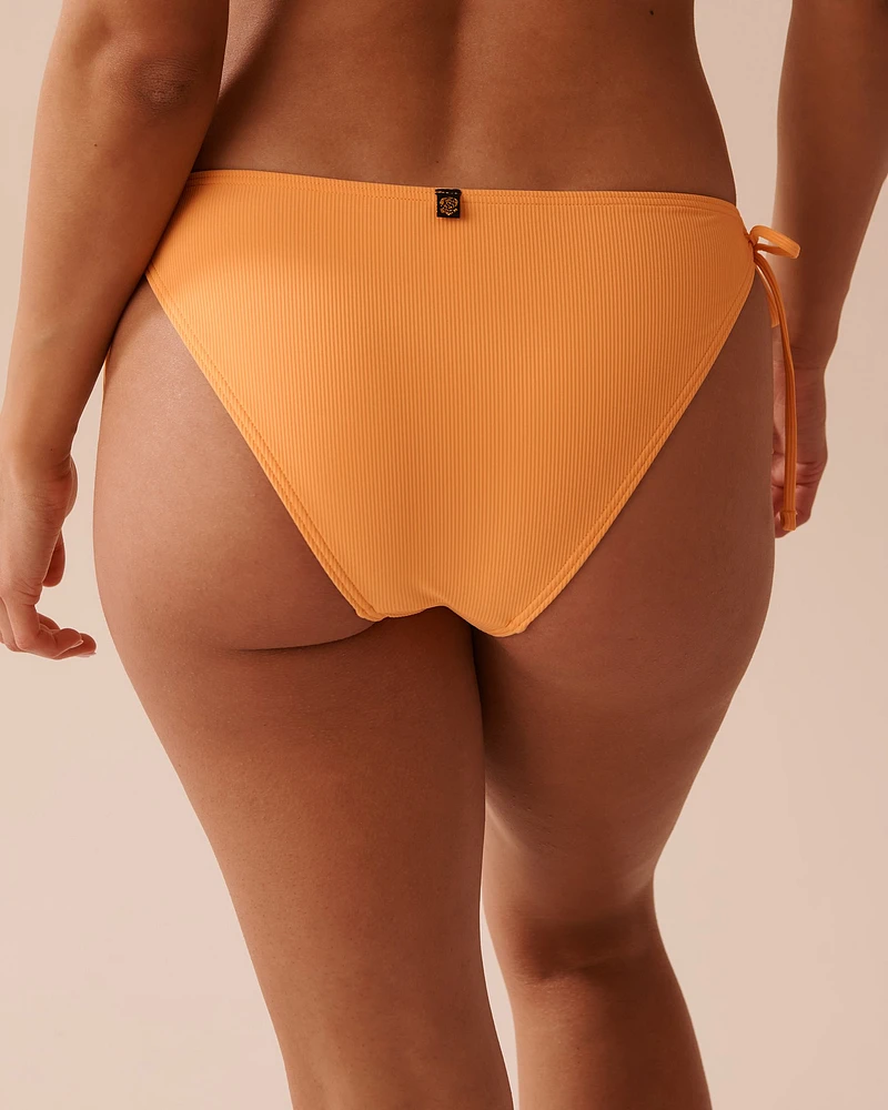 Bas de bikini brésilien noué aux hanches texturé MANGO