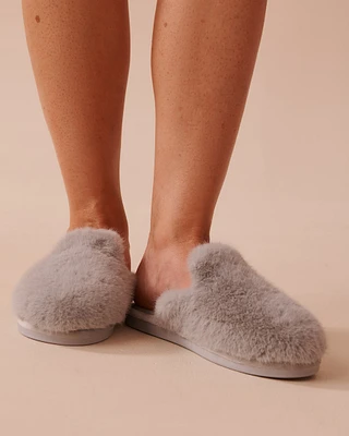 Pantoufles en fausse fourrure longue