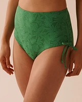 Bas de bikini taille haute noué aux hanches texturé GREEN TROPICAL LEAVES