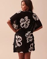 Poncho en résille florale