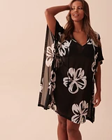Poncho en résille florale