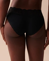 Culotte bikini côtelée bordure de dentelle