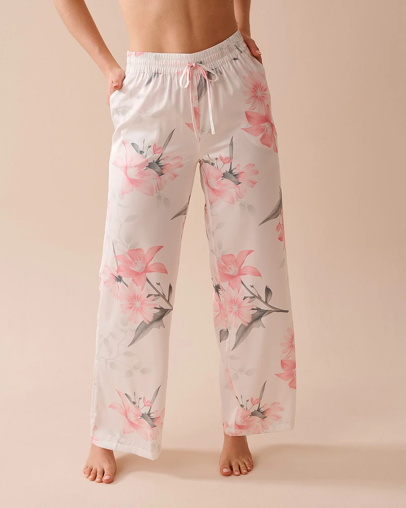 Pantalon en satin à fleurs roses