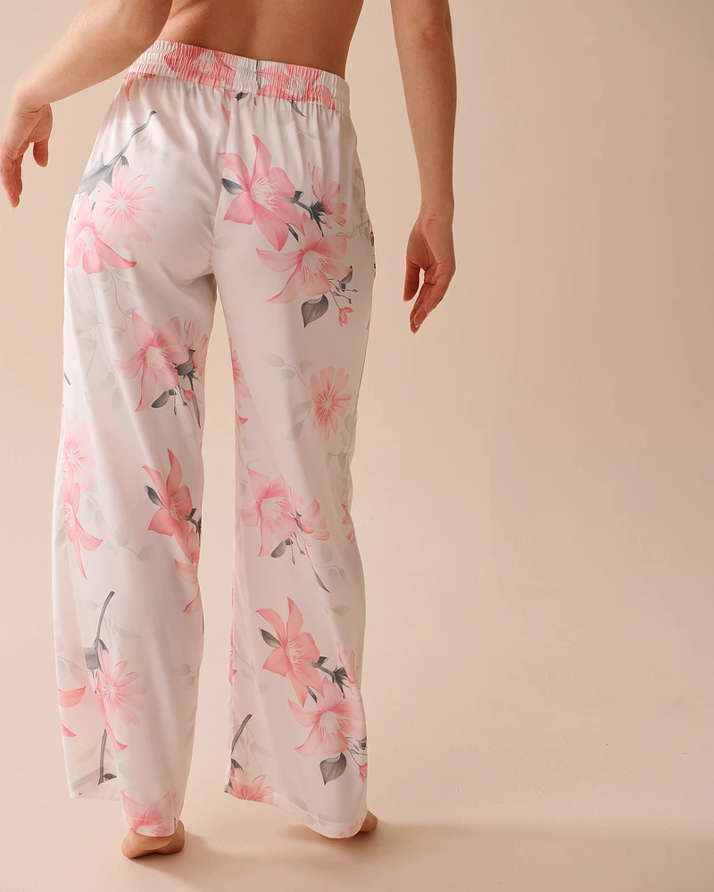 Pantalon en satin à fleurs roses
