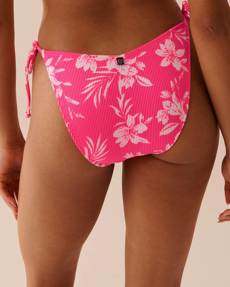 Bas de bikini brésilien coupe en V noué aux hanches texturé ROSE TROPICAL