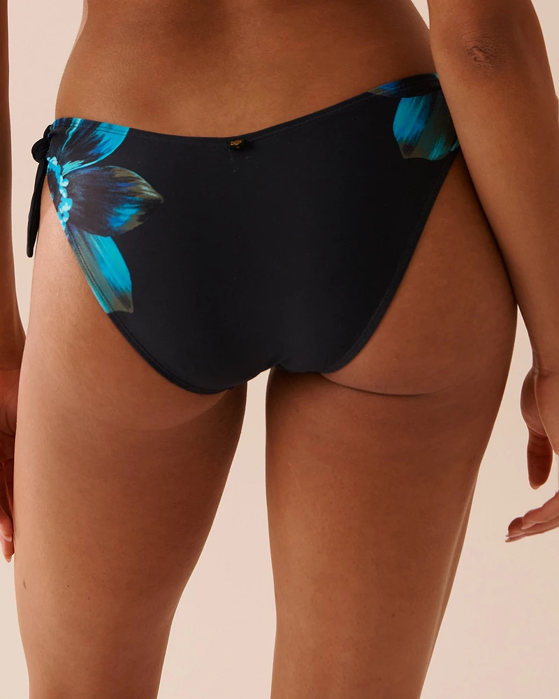 Bas de bikini brésilien coupe en V noué aux hanches FLEURS AQUATIQUES