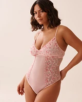 Combiné tanga en résille brodée florale