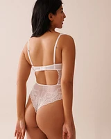 Combiné push-up en dentelle florale et résille