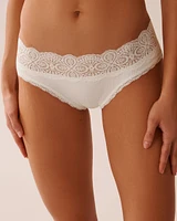 Culotte bikini côtelée bordure de dentelle