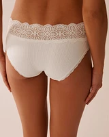 Culotte bikini côtelée bordure de dentelle