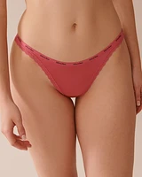 Culotte tanga microfibre et bordure de dentelle