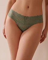 Culotte tanga dentelle à large bande de taille
