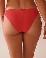 Bas de bikini brésilien noué aux hanches en fibres recyclées HIBISCUS