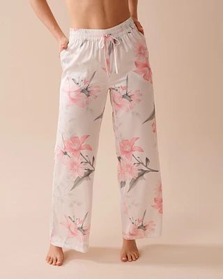 Pantalon en satin à fleurs roses