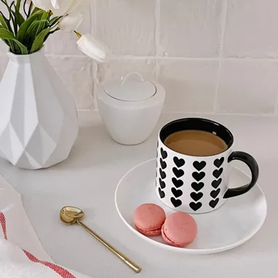 Mug with black heart designs