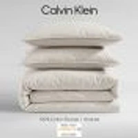 Ensemble de Housse couette solide en percale lavée par Calvin Klein