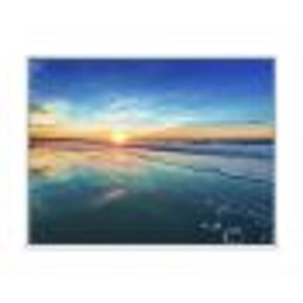 Blue Seashore with Distant Sunset  Canvas Wall Art