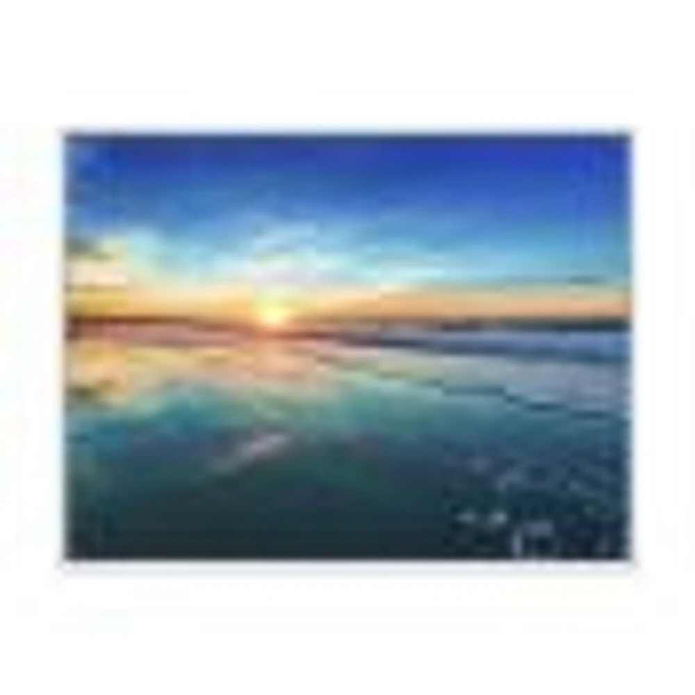 Blue Seashore with Distant Sunset  Canvas Wall Art