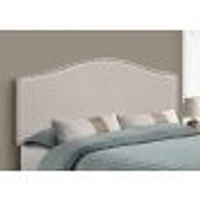 Upholstered Headboard with Antique Brass-Finish Nailheads