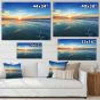 Blue Seashore with Distant Sunset  Canvas Wall Art