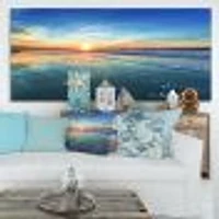 Blue Seashore with Distant Sunset  Canvas Wall Art