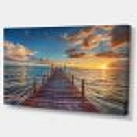 Toile « Brilliant Sunrise over Sea Pier