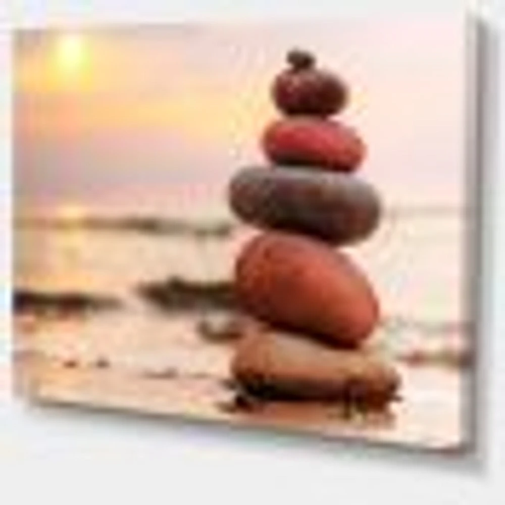 Stones Pyramid on Sand Symbolizing Zen  Wall Art