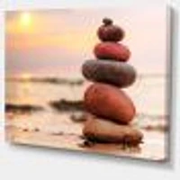 Stones Pyramid on Sand Symbolizing Zen  Wall Art