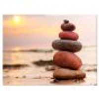 Stones Pyramid on Sand Symbolizing Zen  Wall Art