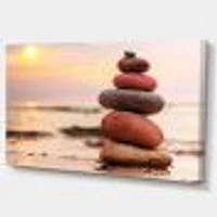 Stones Pyramid on Sand Symbolizing Zen  Wall Art