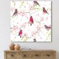 Toile « Red Bullfinches on Magnolia Tree