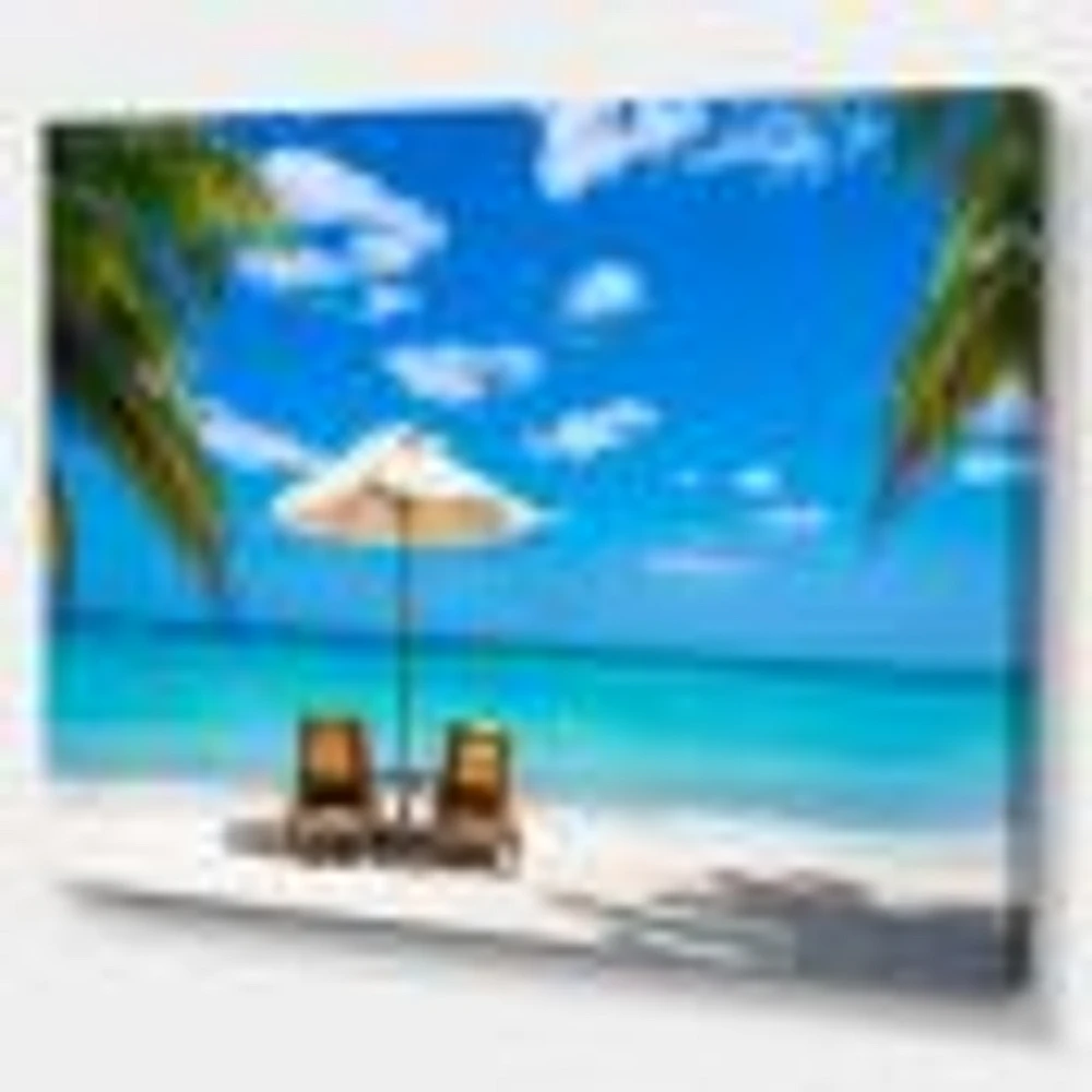 Turquoise Beach with Chairs  Canvas Print