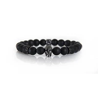 Bracelet onyx noir avec accent crâne gris acier par Luenzo