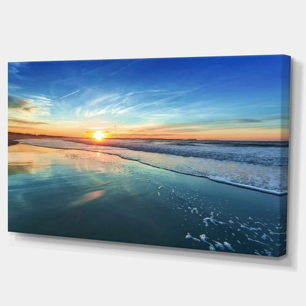 Blue Seashore with Distant Sunset  Canvas Wall Art