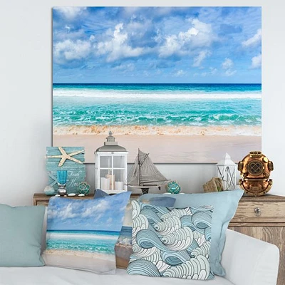 Tranquil Beach Under White Clouds  Canvas Artwork