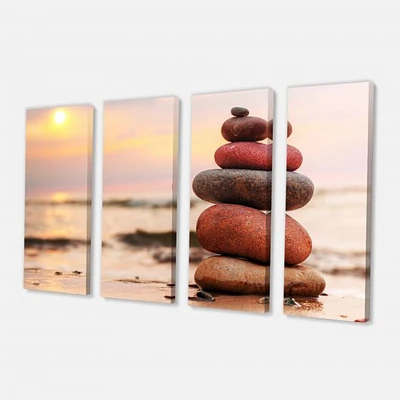 Stones Pyramid on Sand Symbolizing Zen Canvas Wall Art panels