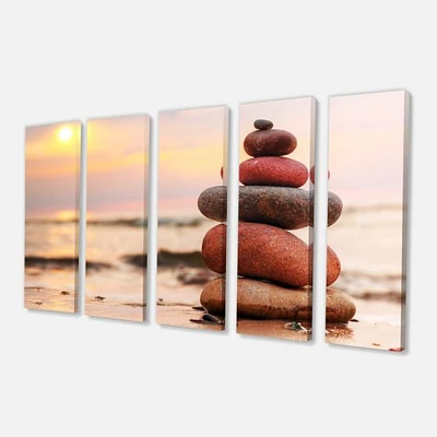 Stones Pyramid on Sand Symbolizing Zen Canvas Wall Art panels