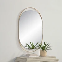 Miroir ovale Ecru en laiton satiné