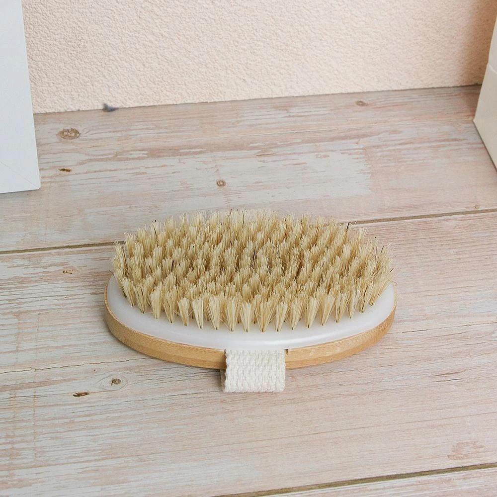 Brosse de bain ovale avec sangle en toile - 12,5 x 6,5 cm