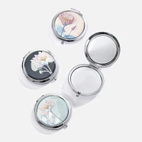 Miroir compact avec design de lotus