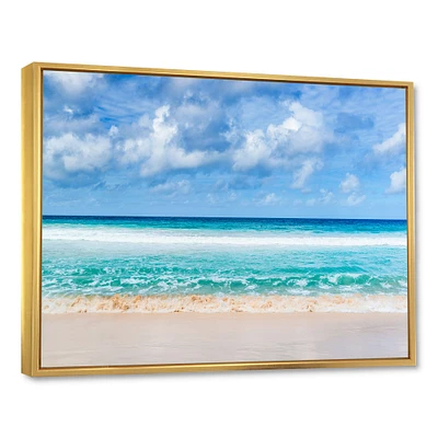 Tranquil Beach Under White Clouds  Canvas Artwork