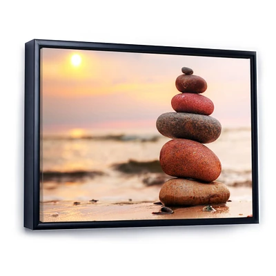 Toile « Stones Pyramid on Sand Symbolizing Zen »